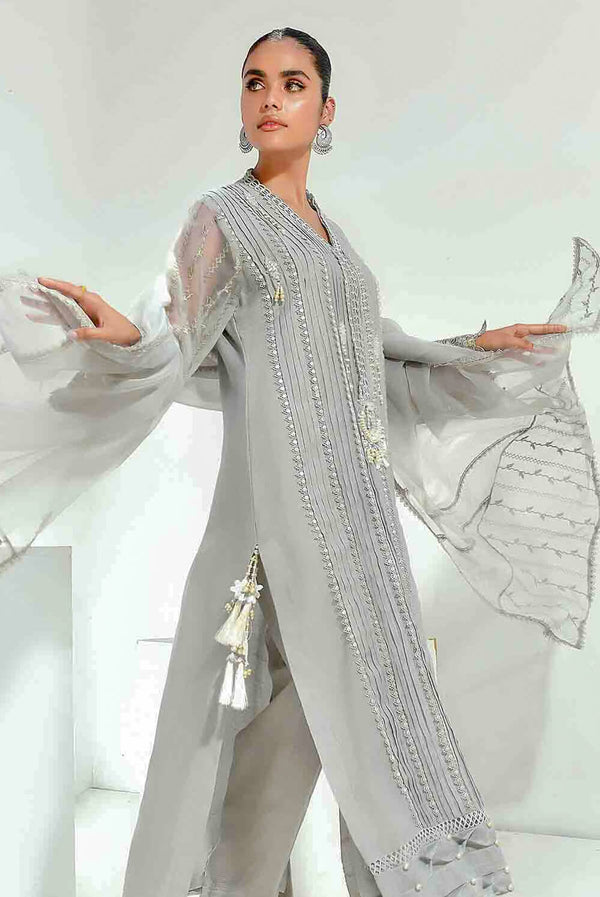 Enhance Your Aura with Kamal Pakistani Designer Dress